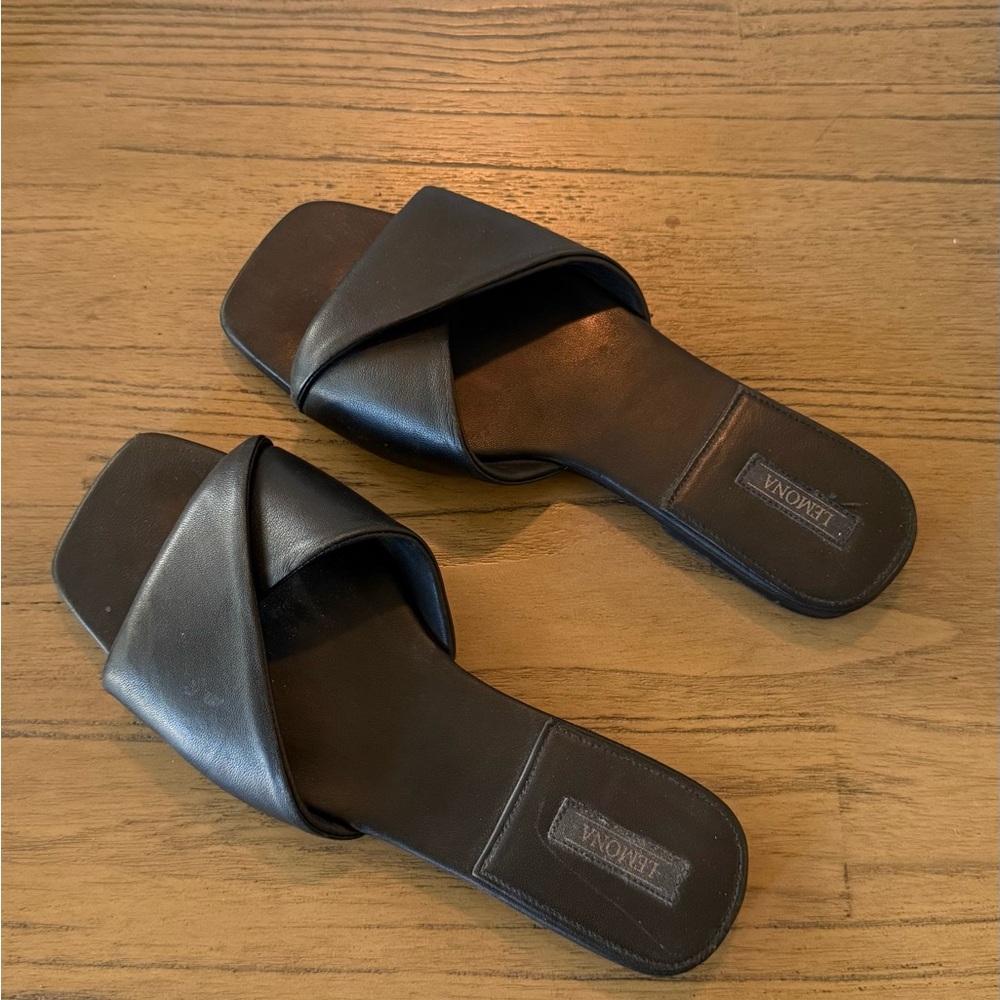 Woman’s Black Leather Slide Sandals